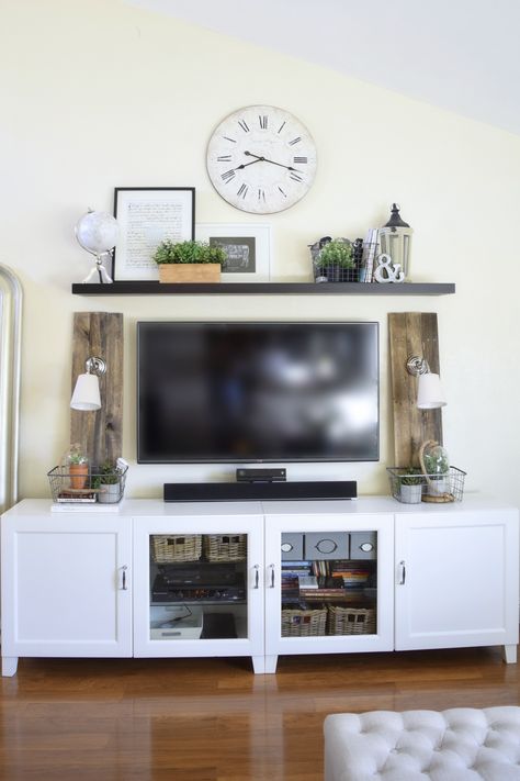 Clock On Tv Wall, Shelf Above Tv On Wall, Wall Clock Decor Living Room Over Tv, What To Put Above Tv On Wall, Clock Above Tv Living Rooms, Shelf Above Tv Decor Ideas, Space Above Tv Decor, Clock Over Tv, Living Room Decor Above Tv