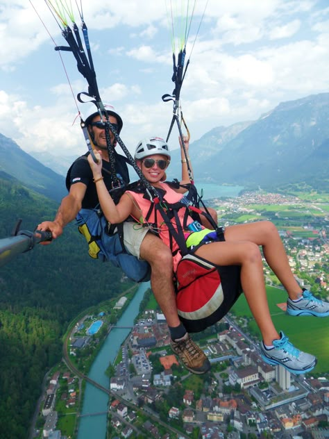 Paragliding in Interlaken, Switzerland the most gorgeous place I have ever seen in my life (Summer 2012) Vision Board Pictures Travel Switzerland, Switzerland With Friends, Paragliding Interlaken, Parasailing Videos, Switzerland Paragliding, Paragliding Photography, Paragliding In Switzerland, Europe Pictures, Aesthetic Instagram Accounts