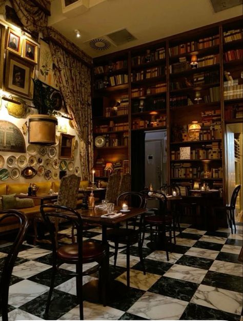 Goth Cafe Interior, Old Fashioned Cafe Interior, Library Bakery Aesthetic, Bookstore Tea Shop, Bookstore Cafe Aesthetic Vintage, Coffee Shop Interior Design Cozy Vintage, 1920s Coffee Shop, Cozy Coffee Shop Aesthetic Vintage, Coffee Shop Dark Academia