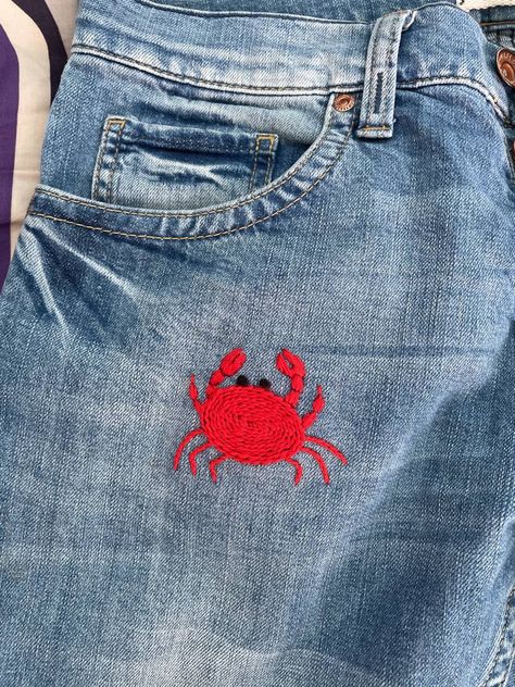 Crab embroidery on jeans Seafood Embroidery, Embroidery On Jeans, Crab Embroidery, Embroidered Jeans Diy, Embroidery Jeans Diy, Fish Embroidery, Jeans Embroidery, Denim Embroidery, Diy Vetement