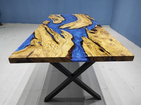 Custom Olive Wood Blue Epoxy Dining Table, Dining Room Table, Kitchen Resin Table, Dining Table Top, Coffee Table Designed by Nature, Perfected by luxuryepoxyfurniture Home decoration with new-generation handmade furniture where nature meets customized designs. Feel mother nature in your living & working space! luxuryepoxyfurniture creates harmony in handcrafted wood & epoxy furniture that will not go out of fashion! ▶️ Play the leading role in the story of each custom piece designed for your ho Epoxy Furniture, Industrial Table Legs, Epoxy Dining Table, Wood Resin Table, River Tables, Resin Decor, Custom Dining Tables, Table Epoxy, Wood Epoxy