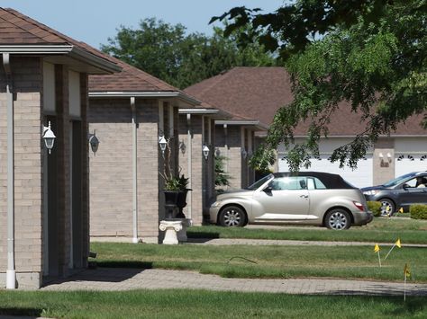 Council backs off regulating snout houses http://windsorstar.com/news/local-news/council-backs-off-regulating-snout-houses A Staff, Back Off, Windsor, The City, Garage Doors, Garage, Design Inspiration, Star Wars, House Design