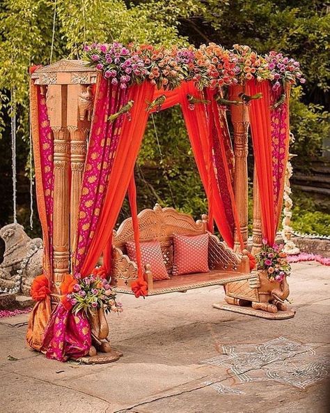 The Prettiest Jhoola Seatings We Spotted! | WedMeGood Backyard Mehndi, Events Decoration Ideas, White Mehndi, Mehndi Stage Decor, Wedding Seating Ideas, Mehndi Decoration Ideas, Pre Wedding Events, Haldi Outfit For Bride, Flower Decoration For Ganpati