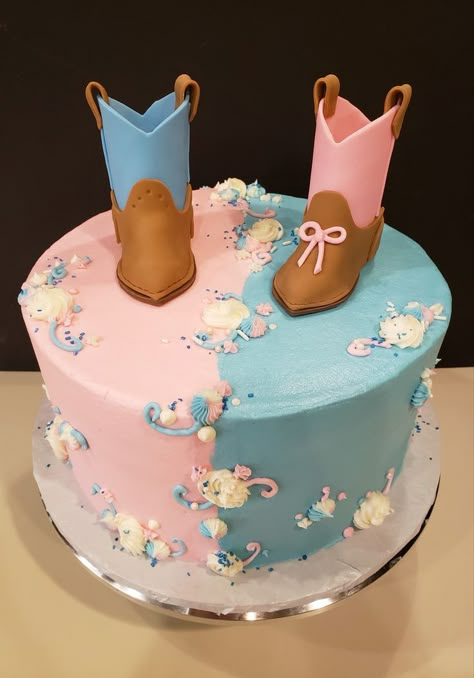 Boy and Girl cowboy boots top this pink and blue buttercream cake. Blue Buttercream Cake, Country Gender Reveal, Baby Shower Gender Reveal Cake, Gender Reveal Baby Shower Themes, Twin Gender Reveal, Baby Gender Reveal Party Decorations, Gender Reveal Announcement, Gender Reveal Party Games, Bow Gender Reveal