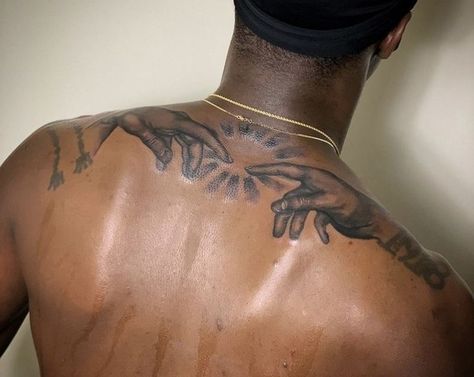 Black Chest Tattoo Cover Up, He Who Hesitates Is Lost Tattoo, Circular Back Tattoo, Afrocentric Art Tattoo, Black Guy Tattoos Ideas, Bicep Filler Tattoo, Black Art Tattoo Men, Black Male Tattoo Ideas, Black Men Back Tattoos