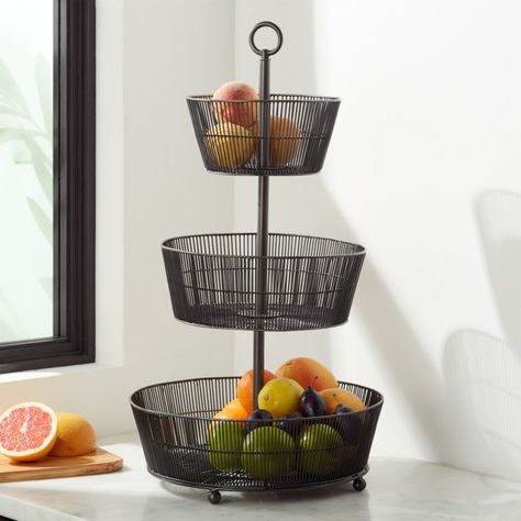 Sale ends soon. Shop Barrett 3-Tier Fruit Basket Graphite. Corral your clementines and elevate your lychees with these tiered baskets handcrafted of iron and finished in sophisticated graphite. Modern Fruit Bowl, Tiered Fruit Basket, Vase Deco, Kitchen Decor Inspiration, Plastic Crates, Fruit Displays, Fruit And Vegetable Storage, Fruit Holder, Basket And Crate