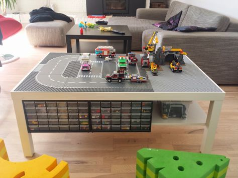 lego table ikea lack table. maybe 1/2 base plates for regular 1/2 base plates for big blocks for Z. and a way to change them out....command strips? Lego Play Table, Lego Storage Diy, Lego Table With Storage, Lego Table Ikea, Ikea Trofast Storage, Lack Coffee Table, Lack Table, Ikea Lack Table, Lego Organization