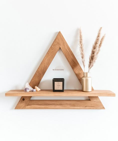 Hi! This amazing wooden shelf is perfect for your home if you are looking for that authentic rustic look. The TRIONE wall shelf is a model made of solid oak. The shelf is in a natural shade. Trione is a triangular shelf with one floor. The shelf looks beautiful on the wall thanks to its non-obvious form. Perfect for rooms decorated in an industrial, minimalist, rustic, boho and wabi sabi style, which is becoming more and more popular. The wooden triangular shelf Trione is a handmade produ... Small Wooden Furniture Ideas, Trending Woodworking Projects, Unusual Shelf Ideas, Creative Shelf Ideas, Small Wood Shelves, Wooden Wall Hanging Ideas, Wall Niche Ideas Entryway, Wooden Crafts Ideas, Wooden Decor Ideas