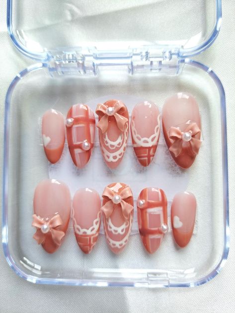 *SETS MAY VARY DEPENDING ON LENGTH* This set of  almond shaped, medium length press on Nails is re-useable and high quality.  If you like coquette, tartan/plaid, pink and kawaii themed nails this is the perfect set for you!  unique and stands out, this style can go with almost any outfit. The Nails are Gel based nails with gems and Nail art added. They are strong and druable and can last up to 2 weeks with proper, nail preparation, application and aftercare. You can also, take them off and save Plaid Nails Pink, Pink Plaid Nails, Alluring Makeup, Hands Artwork, Nessa Nails, Nails With Gems, Almond Press On Nails, Themed Nails, Alphabet Sounds