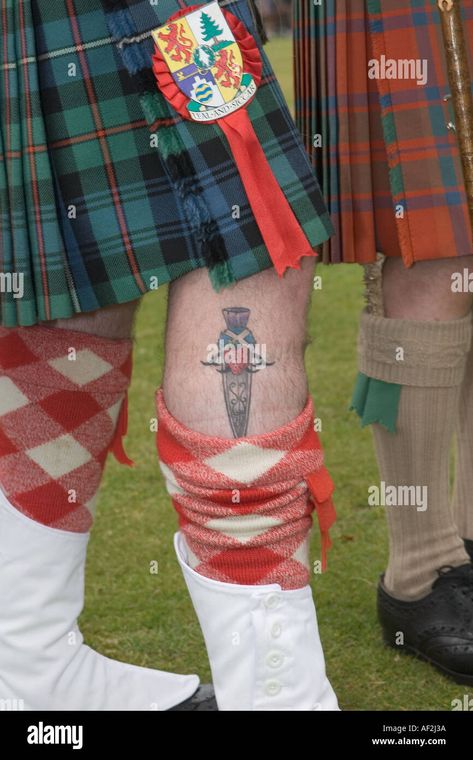 Download this stock image: Tattoo of Skean Dubh (knife) a ceremonial dagger part of the Scottish Highland dress kilt tucked in stocking with pommel visible, UK - AF2J3A from Alamy's library of millions of high resolution stock photos, illustrations and vectors. Sgian Dubh Tattoo, Image Tattoo, Sock Tattoo, Rose And Dagger, Sgian Dubh, Knife Tattoo, Tattoo Rose, Highland Games, Dagger Tattoo