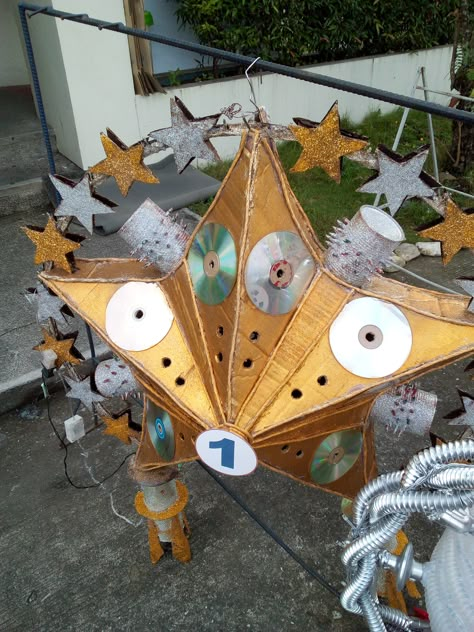 MMG HOSPITAL CALAPAN MINDORO RECYCLED CHRISTMAS LANTERN MAKING CONTEST 2017:PHILHEALTH DEPARTMENT(USED KARTON, CD'S , TIN CANS AND BAMBOO FOR THE BASE) Parol Making Contest, Calapan Mindoro, Parol Designs Recycled Unique, Recycled Christmas Lantern, Parol Ideas Recycled, Parol Making Recycled Materials, Parol Recycled Materials, Parol Designs Recycled, Recycled Parol