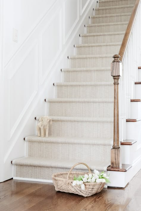 Easy DIY Stair Runner Project | Julie Blanner Stair Runner Over Carpet, Diy Stair Rug Runner, Staircase Runner Rug, Neutral Runner Stairs, Stairwell Runner Ideas, Farmhouse Staircase Runner, Stairs With Runner And Rods, Coastal Stairwell, Refinished Staircase