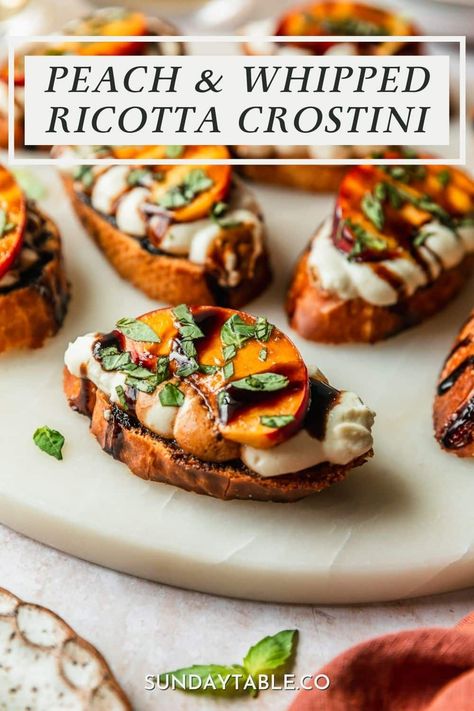 This whipped ricotta crostini is about to be your new favorite appetizer recipe! It has crispy crostini, creamy whipped ricotta cheese, juicy peaches, fresh basil, and balsamic glaze. So good! Of course, you don't have to use peaches on these appetizer bites. You can also try hot honey, pistachios, prosciutto, strawberries, roasted tomatoes, or anything else you like. These crostini are the perfect finger food for a dinner party, holidays, and everything in-between. They're a huge crowd ... Fancy Crostini Appetizers, Burrata And Peaches Appetizer, Whipped Ricotta Crostini, Crostini Ricotta, Whipped Ricotta Cheese, Crispy Crostini, Pear Crostini, Peach Appetizer, Cute Appetizers