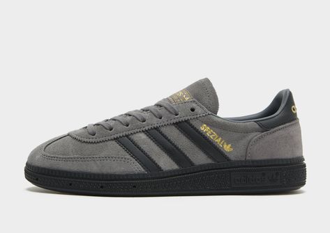 Cop some '70s icons with these juniors' Handball Spezial trainers from adidas Originals. In a Grey Four and Core Black colourway, these classic kicks have a smooth yet durable suede upper with the classic T-toe construction. They feature a lace fastening to lock you in, with a synthetic lining for a snug feel and gum rubber outsole for grippy traction. Finished off with synthetic leather 3-Stripes to the sidewalls and signature Trefoil branding. | JH8664 Spezial Adidas, 70s Icons, Baby Clothes Sale, Kids Clothes Sale, 270 Nike, Nike Metcon, Adidas Spezial, Grey Outfit, Nike Shox