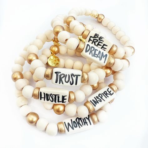 Find our affirmation bracelets now at AudraStyle.com or in boutiques and gift shops across the country! 60+ words and phrases in 6 different colors and prints. ✨ Hand lettered and stretchy to fit. What’s your word? 🤔 #beadedbracelets #wordbracelets #handmadejewelry Affirmation Bracelets, Gift Shops, Word Bracelet, Words And Phrases, Your Word, Clay Bead, Bead Bracelets, Hand Lettered, Clay Beads