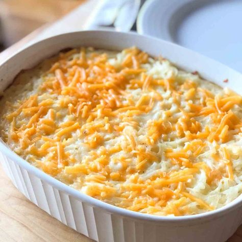 These dairy and gluten free cheesy potatoes are really easy to make but perfect for a special occasion! Your whole family will love them! Gluten And Dairy Free Hashbrown Casserole, Gluten Free Dairy Free Cheesy Potatoes, Dairy Free Potato Casserole Recipes, Dairy Free Cheesy Potato Casserole, Gluten Free Dairy Free Hashbrown Casserole, Gluten Free Cheese Potatoes, Gluten Free Cheesy Potatoes Crockpot, Lactose Free Thanksgiving Recipes, Alpha Gal Recipes Breakfast