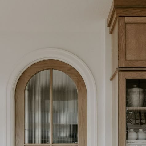 Jill Rolling on Instagram: "The prettiest pantry door we ever did see😍 Oh, and a sneak peek of this beautiful pantry. More pics of this space coming soon! • • • • 📸@brookepavel" Walk In Pantry Doors, Arch Pantry Door, Arched Pantry Door, Wood Pantry Door, Unique Pantry Doors, Arched Interior Doors, Interior Closet Doors, Wainscoting Ideas, Beautiful Pantry