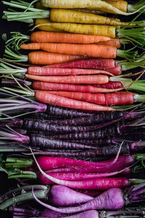 Easy-to-make oven roasted rainbow carrots! The high heat intensifies the carrot flavor and caramelizes the edges as they roast, bringing out their natural sweetness. #rainbowcarrots #roastedcarrots #carrots Homemade Crunchy Granola, Edible Roots, Farm Mural, Fairytale Food, Roasted Rainbow Carrots, Honey Carrots, Burger Side Dishes, Side Dishes For Ham, Carrots Side Dish