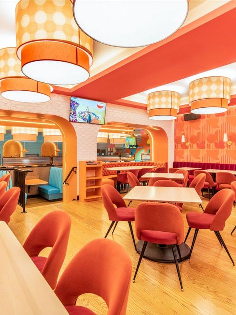 Office Cafeteria Design, Orange Restaurant, Orange Cafe, Colorful Cafe, Cafeteria Design, Louis Poulsen Lighting, Orange Bathrooms, Orange Interior, Eclectic Interior