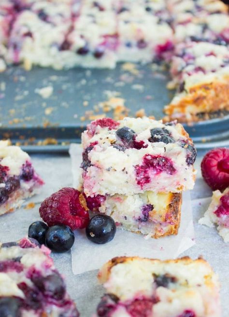 Berry Citrus Poppy Seed Bars stacked on top of each other with a sheet pan of cake bars in the background Poppy Seed Bars, Seed Bars Recipe, Cake Bars Recipe, Seed Bars, Cookie Crunch, Cookie Crust, Bars Recipe, Poppy Seed, Cookbook Recipes