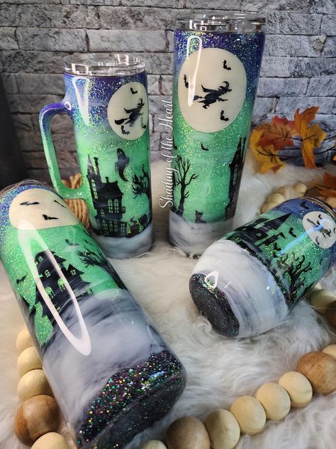 Leap into the spooky season with this custom made glittered 12/14/15/16/20/24/25/30/40 oz stainless steel travel tumbler. Comes with lid, and reusable straw (no straw given for stemless wine tumbler or handled coffee mug). Sealed with epoxy that is safe for incidenal food contact.  Check photos to see what size and type of tumblers are available on hand. Other options may be available upon request but may result delay shipping time. If selecting the 14 oz option, please specify in the notes section if you want your tumbler with a handle or without. *FREE SHIPPING* Do not put in dishwasher, hand wash ONLY! Do not put in microwave! Handle with care! If you have any questions, please feel free to message me. 3d Tumblers With Clay, Fall Tumblers, Fabric Tumblers, Resin Cups, Purple Tumbler, Halloween Tumblers, Starbucks Cup Design, Tumbler Inspiration, Resin Tumblers