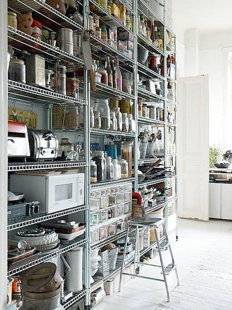 While this isn't built-in, this chef's pantry is a great example how you can buy stainless steel shelving to create an excellent, functional and nice-looking kitchen storage unit. Stainless Steel Kitchen Design, Stainless Steel Shelving, Open Pantry, Kitchen Storage Units, Industrial Kitchen Design, Store Concept, Pantry Shelf, Pantry Ideas, Industrial Kitchen