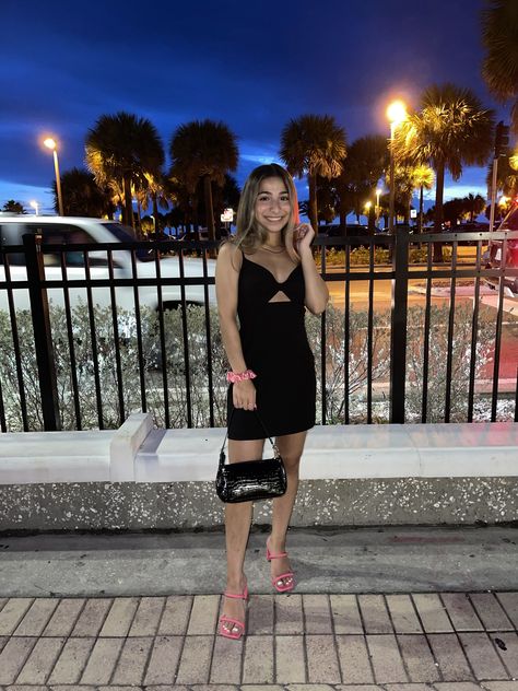 Bright Heels With Black Dress, Black Dress With Pop Of Color Heels, Black Dress Pink Heels Hoco, Black Prom Dress Pink Heels, Black Dress Pink Shoes, Black Dress With Pink Heels, Black Dress Pink Heels, Black Dress And Pink Heels, Short Black Dress Outfit