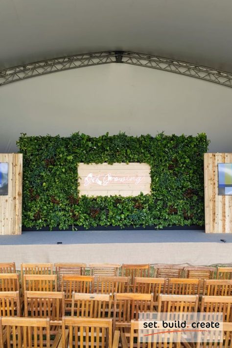 The Get Growing Festival Stage at #RHSHamptonCourt was designed and built by us. Using rustic and sustainable materials - scaffold board, feather edge board, and finished with hessian to create a garden aesthetic that tied in with the living wall. The living wall was formed from a selection of foliage and leaves in different textures, shapes, and colours, to enrich to the backdrop. The complete arrangement nicely complimented the themed talks throughout the event. #Stagedesign #eventprofs Stage Design Greenery, Sustainable Event Decor, A Garden Aesthetic, Garden Stage, Festival Stage, Corporate Events Decoration, Events Place, Church Stage Design, Event Stage