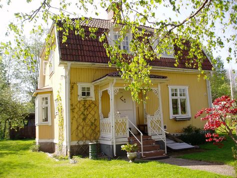 https://flic.kr/p/6cMXPE | My Swedish house, Mullhyttan, Närke 2007 | My beloved Swedish house, located in Mullhyttan village, province of Närke. It was built in 1930, by a housecarpenter, in a much older Swedish turn of the century style, for himself and his wife to live in. He reused a great deal of architectural salvage when he built it, e.g., handmade old glass panes (with bubbles and "streaky" imperfections); 19th century tiled stoves, old timber and some old doors and old door fu Cute Cottages, Swedish Cottage, Little Cottages, Yellow Cottage, Cozy Cottages, Swedish House, Yellow House, Yellow Houses, Cottage Cabin