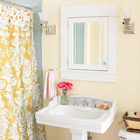 The blue-gray tile in this bathroom is pretty much identical to ours - great color combo with the pale yellow! England Bathroom, Painted Beadboard, Bungalow Bathroom, Beadboard Bathroom, Yellow Shower Curtains, Southern Living House Plans, Yellow Bathroom, Console Sink, Wall Colour