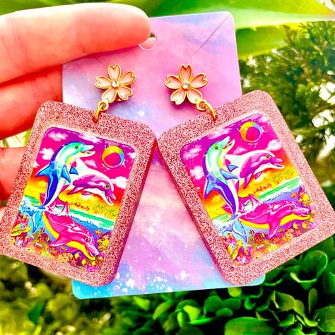 Lisa Frank Dolphin Sticker Acrylic Earrings For Sale! These Earrings Are Absolutely Adorable. They Are Handmade By Me With Resin. Each Earring Has An Original Lisa Frank Sticker Embedded In It. They Are About 3 Inches Tall And About 2 Inches Wide. They Are From My Boutique, And Are Absolutely Cute And One Of A Kind! Lisa Frank Whale, Lisa Frank Earrings, Lisa Frank Accessories, Lisa Frank Beach, Lisa Frank Stationary, Lisa Frank Stickers, Beautiful Beaded Jewelry, Lisa Frank, Birthday Planning