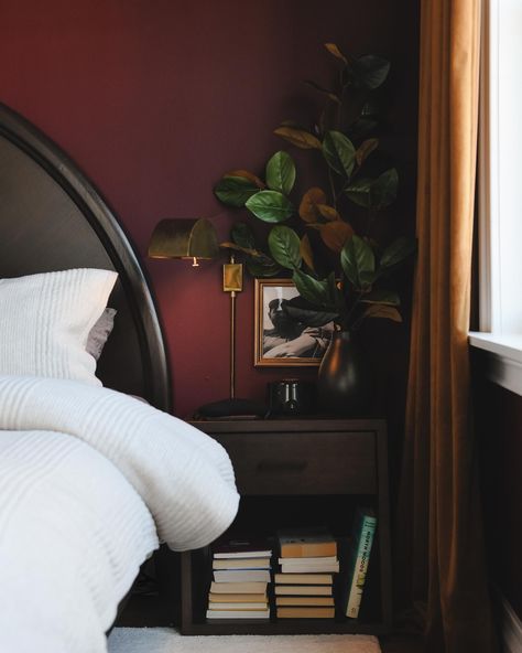 A deep oxblood red takes on a primary bedroom for moody vibes and peaceful evenings. Color is Benjamin Moore Bewitched.  via Yellow Brick Home, moody paint colors, red bedroom, moody bedroom inspo Red Bedroom Colors, Moody Paint Colors, Bedroom Color Palette, Benjamin Moore Bedroom, Moody Paint, Bedroom Moody, Red Paint Colors, Moody Vibes, Yellow Brick Home