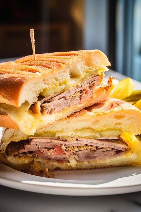 Indulge in the mouthwatering world of Cuban cuisine with our Cubano Sandwich recipe! Crispy, cheesy, and bursting with flavor, it's a taste of Havana in every bite. Try it today and transport your taste buds to Cuba! Cuban Panini Sandwiches, Cubano Sandwiches Recipe, Sandwich Cubano, Tuna Salad Sandwich Recipe, Cubano Sandwich, Tuna Salad Sandwich, Cuban Cuisine, Cuban Sandwich, Tuna Sandwich