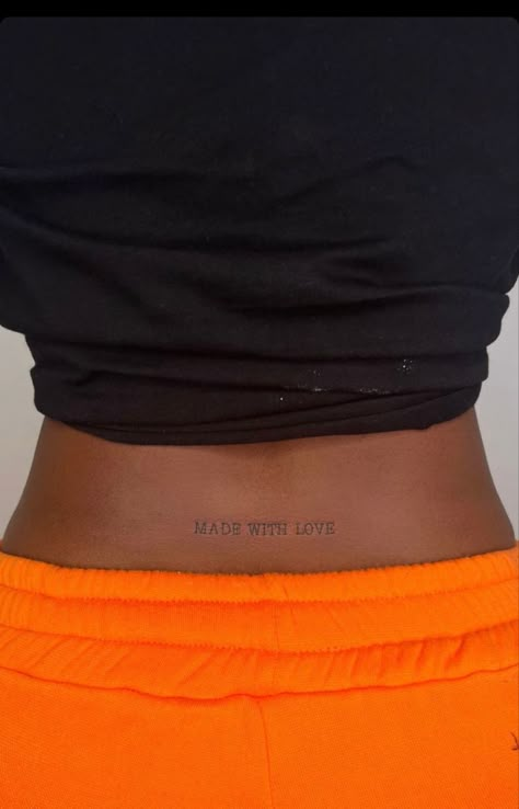 Back
Small font
Cute
Black ink
Tattoo 
Black girl Tramp Stamp Tattoos Words, Cute Shoulder Tattoos, Back Tattoo Women Spine, Tramp Stamp Tattoos, Waist Tattoos, Cute Hand Tattoos, Black Girls With Tattoos, Petite Tattoos, Back Of Shoulder Tattoo