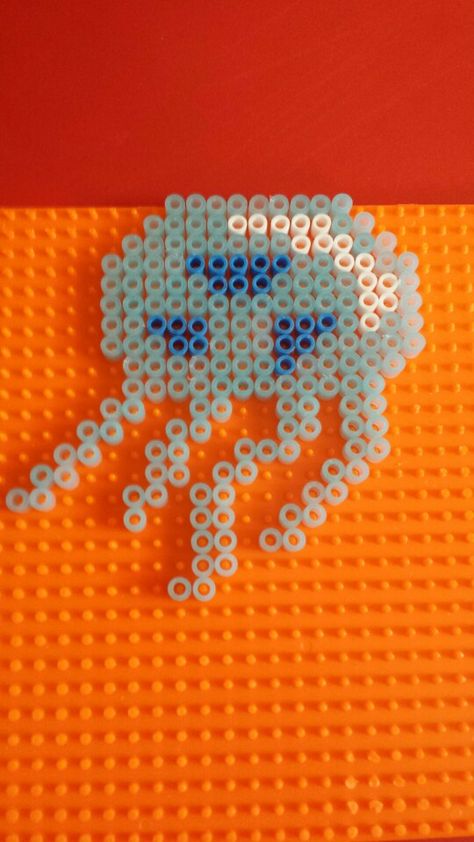 Perler bead jellyfish hama fuse melty beads. By Chloe Hunter. Jellyfish Perler, Bubble Perler Beads, Perler Bead Jellyfish, Peeler Bead Ideas Big, Perler Beads Without Black, Jellyfish Perler Bead Patterns, Jelly Fish Perler Beads, Ocean Perler Bead Patterns, Ocean Perler Beads