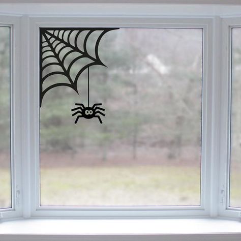 Halloween is creeping up on us! Our halloween window stickers collection is perfect for decorating your home this Halloween. This spider cobweb window sticker design features a spider cobweb perfect for applying to a window or patio door. The spider come separate to the cobweb so you’re able to apply this in either corner of your window. All our window stickers are easy to apply, simply peel away from the backing sheet and apply where you wish. What’s more, they are re-positionable and re-usable Halloween Painting On Windows, Halloween Decoration Window, Witch Window Decor, Halloween Shadow Window, Halloween Window Drawing Ideas, Window Art Halloween, Fall Window Painting Ideas For Classroom, Easy Halloween Window Painting Ideas, Halloween Window Decor