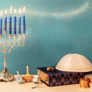 What Is Hanukkah? History, Traditions and Why We Celebrate Hanukkah What Is Hanukkah, Hanukkah Traditions, Vintage Typography Design, Spinning Top Toy, Hanukkah Crafts, Hanukkah Candles, Hanukkah Decorations, Single Candle, Religious Freedom