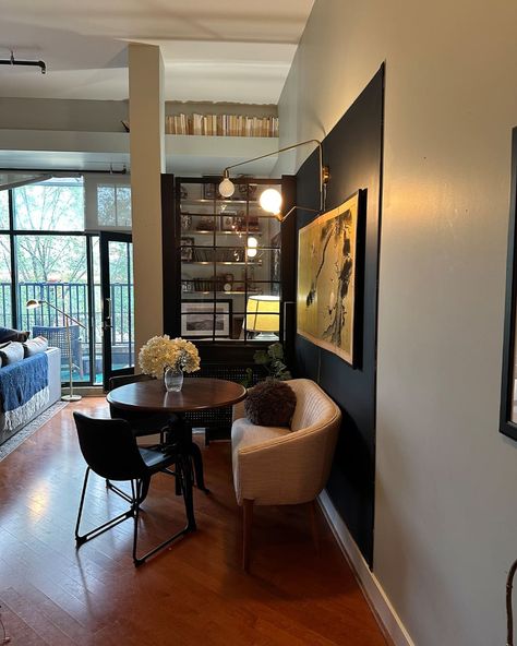 Dining room with large leather bench seating and 2 modern black chairs around round table Renter Friendly Banquette, Green Velvet Banquette, Pink Velvet Banquette, Midcentury Banquette Seating, Ikea Sliding Door, Divided Living Room, Velvet Banquette, Ikea Picture Frame, Ikea Art