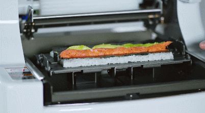 AUTEC Maki Sushi Robot Produces 450 Rolls an Hour Sushi Machine, Maki Sushi, A Robot, Food Stuff, Griddle Pan, Food Preparation, Low Cost, Rolls, Tools