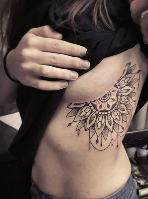 a list with 50 of the most beautiful mandala tattoo designs we've seen and the symbolism behind this sacred & timeless pattern. #chesttattoos #tattoo #tattoos Mandala Chest Tattoo, Underboob Tattoos, Delicate Tattoos For Women, Underboob Tattoo Designs, Rib Tattoos For Women, Hamsa Tattoo, Underboob Tattoo, Muster Tattoos, Chest Tattoos For Women