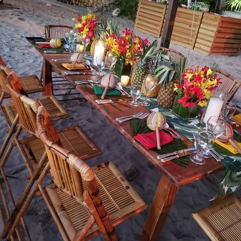 Reggae Beach Party Anyone??? 🙋‍♂️🙋‍♀️ #taifloraluxe #taiflora #destinationwedding #jamaica #decor #weddings #weddingflorals #party #reggae #redgreenandgold #seatingchart tropical #beach #furniture #florals #lighting #candles #funcenterpieces #bestinthebusiness Jamaican Table Decorations, Reggae Party Ideas Decoration, Jamaica Decor, Reggae Wedding, Rasta Party Invitation, Reggae Birthday, Jamaica Party, Tryall Club Jamaica Wedding, Dinner Picnic