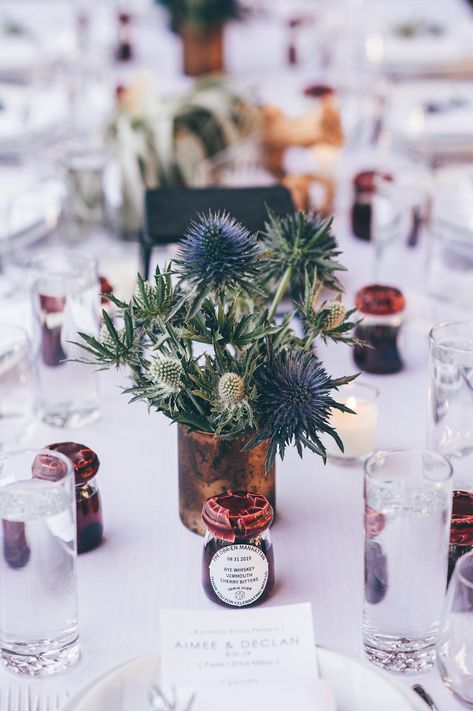 Blue and green thistle wedding centerpieces for the BoxHouse Hotel. Thistle Wedding Table Decorations, Thistle Table Decorations, Thistle Floral Arrangement, Scottish Wedding Centerpieces, Thistle Centre Pieces Wedding, Thistle Wedding Centerpieces, Scottish Wedding Table Decorations, Thistle Centerpiece Wedding, Scottish Wedding Ceremony