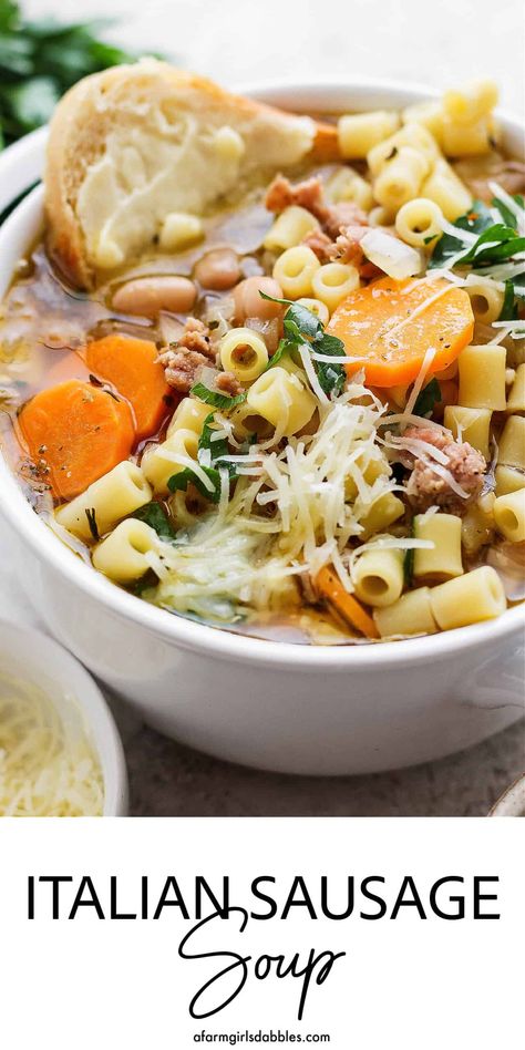 This Italian Sausage Soup recipe features an herby white wine-infused broth loaded with Italian-flavored chicken sausage, creamy white beans, tender ditalini pasta, and fresh carrots. It's a hearty-yet-light, family-pleasing, comfort food meal! Flavored Chicken, Italian Chicken Pasta, White Bean Recipes, Sausage Soup Recipes, Fresh Carrots, Italian Sausage Pasta, Italian Sausage Soup, Ditalini Pasta, Ground Italian Sausage