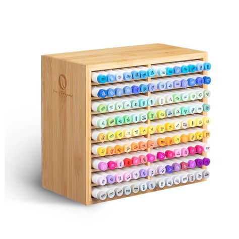 PRICES MAY VARY. CRAFTED WITH ELEGANCE FROM NATURAL BAMBOO: The Ohuhu Bamboo Marker Organizer is expertly made from bamboo, ensuring a high-quality storage solution. It's corrosion-proof, easy to clean, and environmentally friendly. GENEROUS STORAGE FOR EFFICIENCY: With 18 compartments, this marker holder can hold up to 126 alcohol markers. Keep your markers organized, clean, and ready to use. It's perfect for art teachers, students, and anyone seeking to keep their art supplies impeccably arran Marker Organizer, Alcohol Art, Marker Holder, Pencils Art, Ohuhu Markers, Stationary Organization, Marker Storage, Pens Pencils, Create Words