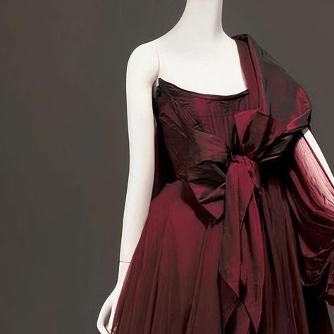 The Vivienne Westwood Archives on Instagram: "Vivienne Westwood’s gown’s at various exhibitions! 1. Gown from the A/W 1996 ‘Storm in a Teacup’ collection, on display at Museum of Fashion in Moscow. 2. & 10. Gown from the A/W 2005/2006 ‘Propaganda’ collection, on display at @metmuseum. 3. Tartan wedding gown from the A/W 1993 ‘Anglomania’ collection, on display at @nationalgalleryaus. 4. Gown from the Spring/ Summer 1994 ‘Café Society’ collection, on display at @vamuseum. 5. ‘Fragonard’ gown f Vivienne Westwood Dresses, Vivienne Westwood Dress, Teacup Collection, Storm In A Teacup, Deep Red Dress, Burgundy Gown, Famous Dress, Dresses 2013, Ethical Fashion Brands