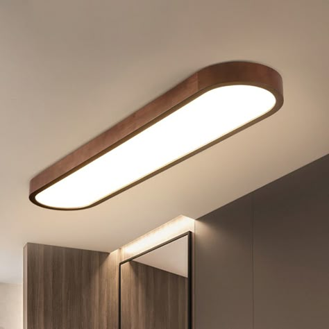 This Oblong Surface Mounted LED Ceiling Light is the perfect addition to any home. The sleek and modern design will give your space a stylish edge, and the natural Timber finish will add a warm touch to any home. The brown finish is also fade and heat resistant, meaning it will last a long time in a variety of climates. The simple flush mount design means it can either be mounted on the wall or ceiling depending on your preference.The light is made of high quality metal for durability and comes Closed Kitchen Lighting, Ceiling Lights Mounted, Surface Mounted Lights Ceilings, Surface Mount Light Fixture, Modern Surface Mount Lighting, Outdoor Ceiling Lamp, Ceiling Lights Low Ceiling, Surface Mounted Ceiling Lights, Ceiling Lamp Bathroom