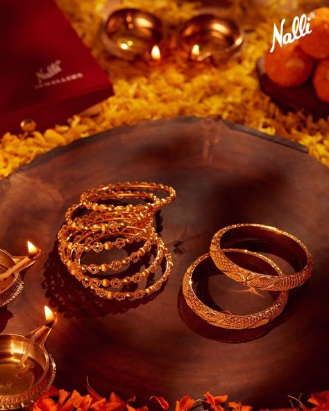 This designer gold bangle set is crafted in 22-karat gold with intricately textured filigree metal work in a floral pattern and will go with any traditional outfit. Pair this with a bright Banarasi Silk saree, choker, and flats to complete the look. Bangles Photoshoot Ideas, Bangles Photography, Jewellery Fashion Shoot, Necklace Set Indian Bridal Jewelry, Photoshoot Reference, Jewellery Shoot, Silk Bangles, Photographing Jewelry, Jewellery Photography Inspiration