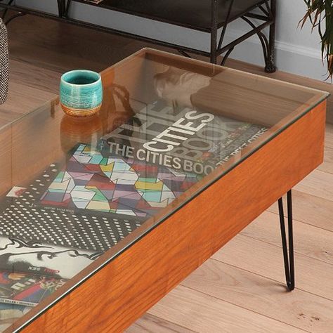 the Gallery Coffee Table lets you show off beautiful "coffee table books" without losing a usable surface. At Urban Outfitters Best Coffee Tables, House Hunting, Glass Coffee Table, Top Ten, Best Coffee, Coffee Tables, Urban Outfitters, Hunting, Coffee Table