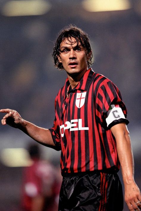 Paolo Maldini, one of the greatest defenders of all time. He played his entire career for AC Milan. #acmilan Paolo Maldini, Soccer Player, Ac Milan, Red And Black, Milan, Soccer, Red, Black, Football