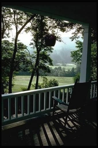 Overlooking the farm. What a stunning view from this porch. Love the balustrade too. Porch Life, Peaceful Places, Rocking Chairs, Decks And Porches, Jolie Photo, Green Gables, Porch Patio, Country Life, Country Living